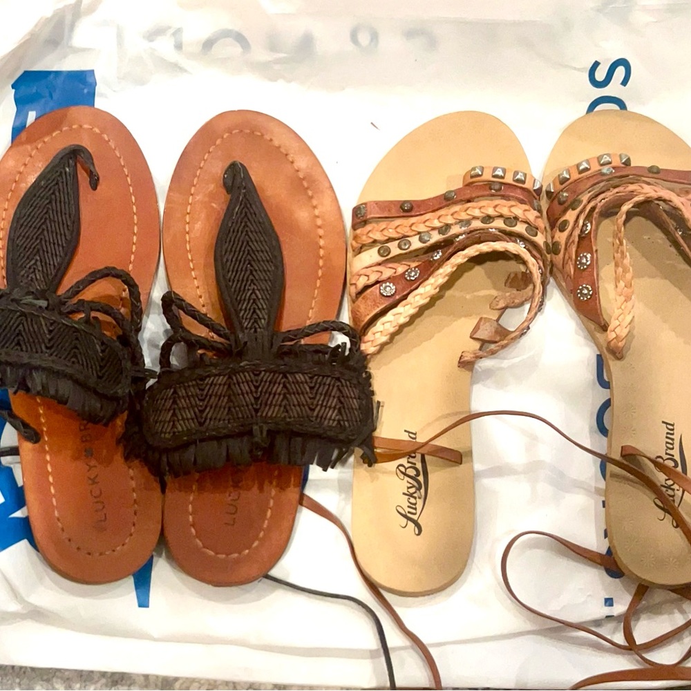 2 pairs of lucky brand sandals, one brown/tan, one black both size 5.5
